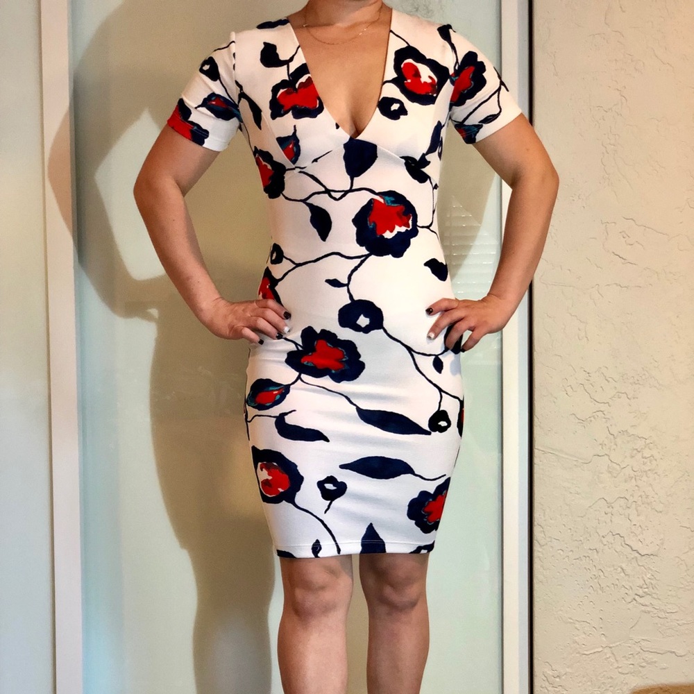 Never been worn! White floral dress.